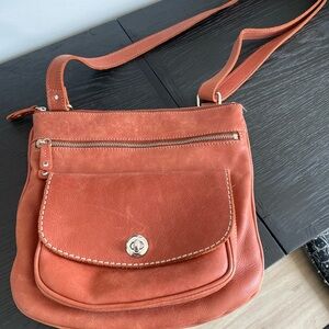 Roots Riverside Saddle Tribe Handbag